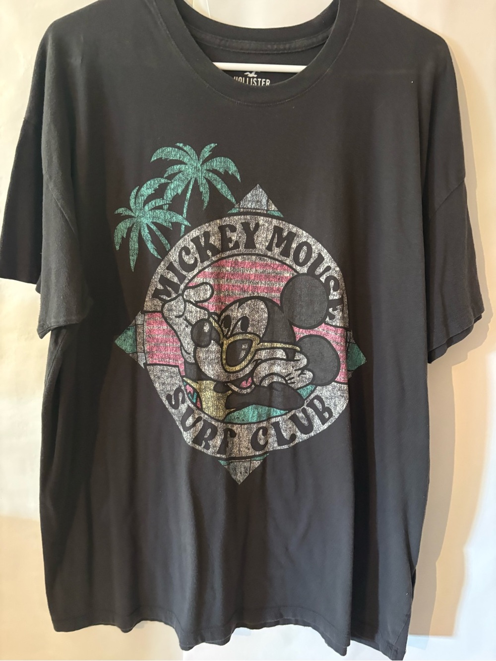 Hollister Black Graphic Tee with Teal and Pink Surf Design